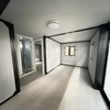 Wood Grain Flat Top Expandable Folding Container House Prefabricated House
